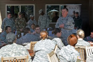 Maj. Gen. Glenn H. Curtis, the Adjutant General for the Louisiana National Guard, discusses reenlistment options with Soldiers from the 2228th Military Police Company during a retention event in Alexandria, La., Dec. 5, 2015. The event allowed Soldiers who were nearing the end of their contracts to discuss their careers with leaders, ask questions, and resolve issues that may have prevented them from continuing to serve. (U.S. Army National Guard photo by Staff Sgt. Scott D. Longstreet)