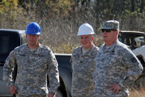 Louisiana National Guard 2nd Lt. Robert Parker, of Mandeville, briefs Capt. David Haydel, task force commander, and Maj. Gen. Glenn H. Curtis, LANG adjutant general, on a levee construction project on Avoca Island to protect Morgan City from backwater flooding due to high river levels, Jan. 9, 2016. (U.S. Army National Guard photo by Spc. Garrett L. Dipuma)