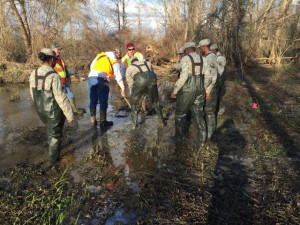 Louisiana National Guard Soldiers from the 528th Engineer Battalion, 225 Engineer Brigade monitor a water boil near St. Joseph, La., along the Mississippi River, Jan. 12, 2015. The Soldiers were ordered to state active duty to patrol the levees with the US Army Corps of Engineers to look for seepage, levee slides and sand boils, Jan. 4-22. (U.S. Army National Guard photo by Command Sgt. Maj. Rufus Jones)