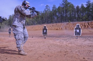 Staff Sgt. Samuel Stevenson of Bienville, La., a cavalry scout with A troop, 2nd Squadron, 108th Cavalry Regiment executes a lateral movement during Short Range Marksmanship qualifications at the Rifle Marksmanship Instructor Course at Ft. Polk, La., Jan 21. (U.S. Army National Guard photo by Sgt. Noshoba Davis)