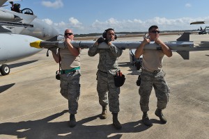 Airmen with the 159th Aircraft Maintenance Squadron load crew, Louisiana Air National Guard, remove an AIM-9 missile from an F-15 Eagle during the Combat Archer at Tyndall Air Force Base, Florida, Feb. 23, 2016. Combat Archer is a two-week exercise and is part of the Air Combat Command Air-to-Air Weapons Systems Evaluation Program, which assesses a units overall operational effectiveness, weapons systems performance and reliability. (U.S. Air National Guard Force photo by Master Sgt. Toby Valadie)