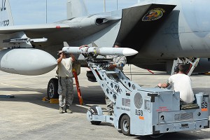 Airmen with 159th Aircraft Maintenance Squadron load crew, Louisiana Air National Guard, load an AIM-120 AMRAAM missile onto an F-15 Eagle during the Combat Archer at Tyndall Air Force Base, Florida, Feb. 23, 2016. During Combat Archer the 159th Fighter Wing will fly 147 sorties, fire 10,000 20MM bullets and fire 17 live missiles. (U.S. Air National Guard Force photo by Master Sgt. Toby Valadie)