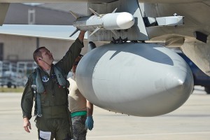 Col. Michael McDermott, vice wing commander, 159th Fighter Wing, Louisiana Air National Guard, inspects an AIM-120 AMRAMM missile prior to takeoff during the Combat Archer at Tyndall Air Force Base, Florida, Feb. 23, 2016. Combat Archer is a two-week exercise and is part of the Air Combat Command Air-to-Air Weapons Systems Evaluation Program, which assesses a units overall operational effectiveness, weapons systems performance and reliability. (U.S. Air National Guard Force photo by Master Sgt. Toby Valadie)