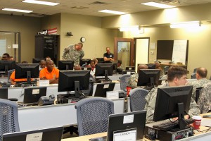 The Louisiana National Guard’s cyber protection teams, in partnership with state and federal government officials, came together at Louisiana State University’s Stephenson Disaster Management Institute, in Baton Rouge, to participate in a Vigilant Guard exercise to rehearse and demonstrate the capabilities of maintaining cyber security, April 13, 2016. Vigilant Guard is a federally funded exercise that is supported by the National Guard Bureau and sponsored by the United States Northern Command (USNORTHCOM), whose mission is to provide homeland defense, civil support and security cooperation to defend and secure the United States and its interests. (U.S. Army National Guard photo by Spc. Tarell J. Bilbo/Released)