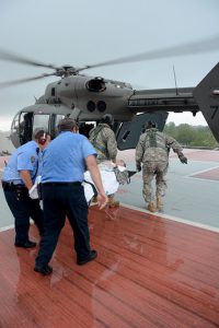 Staff Sgt. Frank Skyles & Sgt. Cody Westmoreland, UH-72A crewmembers from Detachment 1, Delta Company, 2nd Battalion, 151st Aviation Regiment, Louisiana Army National Guard, along with East Jefferson General Hospital emergency medical staff, transport a simulated casualty for aeromedical evacuation during a Vigilant Guard emergency exercise, April 15, 2016. This aeromedical evacuation exercise is part of Vigilant Guard, a federally funded exercise that is supported by the National Guard Bureau and sponsored by the Unites States Northern Command, whose mission is to provide homeland defense, civil support and security cooperation to defend and secure the United States and its interests. (U.S. Army National Guard photo by 1st Sgt. Paul Meeker)