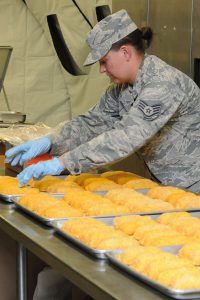 Tech. Sgt. Emily Galloway, 159th Force Support Squadron, Louisiana Air National Guard prepares chicken cordon blue in a dining facility during a Silver Flag training exercise June 9, 2016, Ramstein Air Base, Germany. Silver Flag is a weeklong simulated bare base bed down and sustainment operations in a contingency environment. (U.S. Air National Guard photo by 1st Lt. Larissa Lambert/Released)