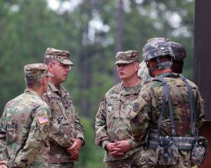 Lt. Col Mark A. Howard, 139th Regional Support Group commander, briefs Maj. Gen. Barry P. Keeling, the assistant adjutant general of the Louisiana National Guard, about the range fire training and qualifications at Camp Shelby, in Hattiesburg, Mississippi, June 11, 2016. Keeling toured various training locations throughout Camp Shelby and met with Soldiers during their annual training. (U.S. Army National Guard photo by Capt. Anthony G. Kelly, 139th Regional Support Group)