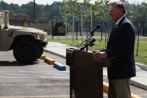 Louisiana Governor John Bel Edwards’ Chief of Staff Ben Nevers speaks at an official ribbon cutting ceremony marking the opening of a new Readiness Center in Franklinton for the Louisiana National Guard’s 843rd Horizontal Engineer Company, 205th Engineer Battalion Sept. 22, 2016. (U.S. Army National Guard photo by Spc. Garrett L. Dipuma)