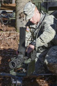 Louisiana National Guard's Spc. Dylan Cassel with A Troop, 2nd Squadron, 108th Cavalry Regiment, 256th Infantry Brigade Combat Team disassembles a .50-caliber machine gun during the annual Spur Ride at Camp Minden in Minden, Louisiana, Dec. 10, 2016. Soldiers drew two weapons from a box that they would have to reassemble and perform a functions check on those weapons in an allotted amount of time. (U.S. Army National Guard photo by Sgt. Noshoba Davis)