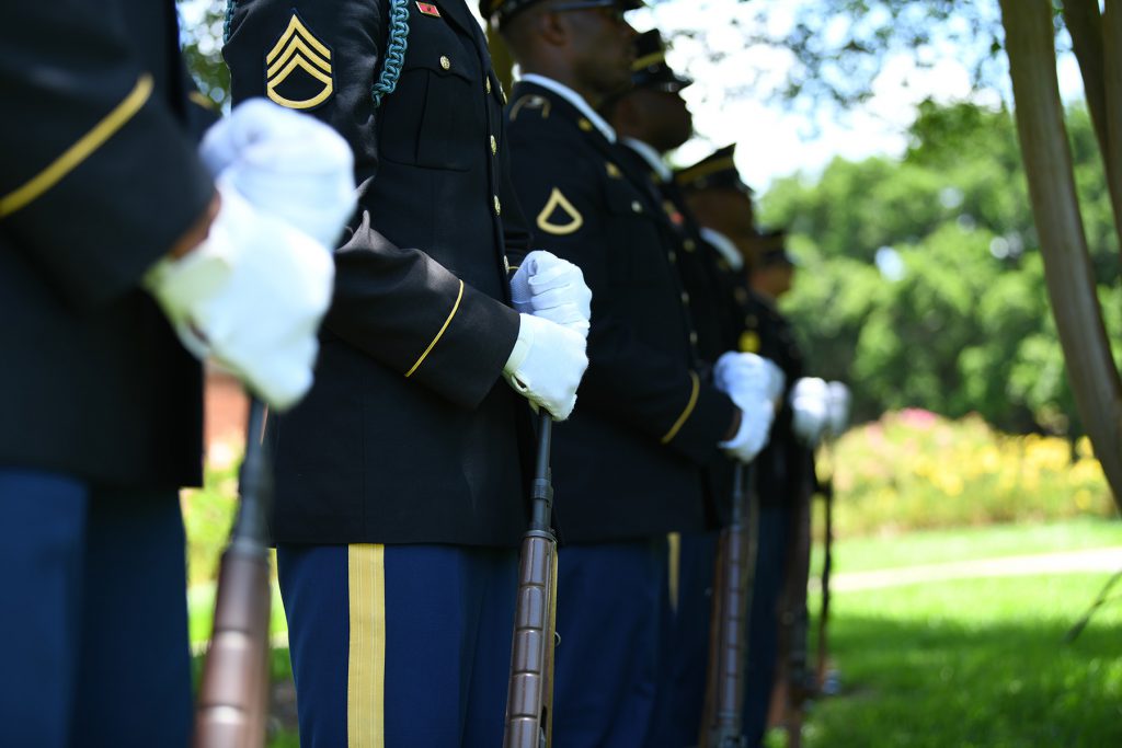 Soldiers in the Louisiana National Guard Military Funeral Honors Program stand ready to render a firing party salute during an official ceremony memorializing a new monument honoring fallen Louisiana Guardsmen at Louisiana Veterans Memorial Park in Baton Rouge, Louisiana, May 21, 2019. (U.S. Army National Guard photo by Staff Sgt. Garrett L. Dipuma)