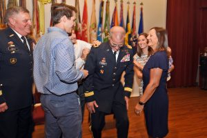 Brig. Gen. Damian "Keith" Waddell, the assistant adjutant general of the Louisiana National Guard, is pinned with his new general officer rank insignia by his wife, Lisa, and his kids, Michael, Kimber and Kenny, during an official ceremony at Camp Beauregard in Pineville, Louisiana, Aug. 10, 2019. Waddell assists the adjutant general in formulating, developing and coordinating programs, policies and plans for the entire Louisiana Army and Air National Guard. Waddell is an assistant principal at Westlake High School and has worked in the Louisiana Education Department for the last 24 years. (U.S. Army National Guard photo by Staff Sgt. Garrett L. Dipuma)