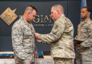 Maj. Gen. Glenn H. Curtis, adjutant general of the Louisiana National Guard, awards Capt. Alex Sattler, 259th Air Traffic Control Squadron, Louisiana Air National Guard, the Bronze Star Medal during the 259th award ceremony at the England Air Park Terminal in Alexandria, Louisiana, April 15, 2018. Sattler was one of 16 Airmen from the LAANG honored for their deployment to Iraq in support of Operation Inherent Resolve. (U.S. Air National Guard photo by Senior Airman Cindy Au)