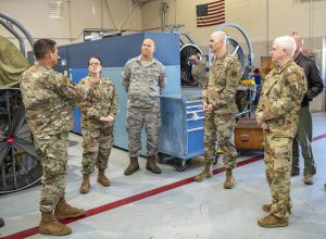 Chief Master Sgt. Gerald Raynal, Command Chief of the 159th Fighter Wing, Louisiana Air National Guard, introduces Engine Shop Technicians Master Sgt. Crystal and Tech. Sgt. John Larrieu to Lt. Gen. L. Scott Rice, director of the Air National Guard and Chief Master Sgt. Ronald Anderson, Command Chief of the Air National Guard, during a Wing visit at Naval Air Station Joint Reserve Base New Orleans, Nov. 3, 2019. The husband and wife Airmen started the “Wingman Cancer Foundation”, which assists Wing and Wing family members with financial burdens associated with cancer treatment and recovery. (U.S. Air National Guard photo by Senior Master Sgt. Dan Farrell)