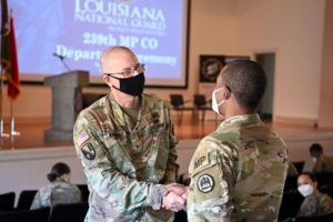 Brig. Gen. Keith Waddell, adjutant general of the Louisiana National Guard, thanks a soldier for serving prior to 239th Military Police Company, 773rd Military Police Battalion, ceremony at Gillis W. Long Center, Carville, La., May 15, 2021, before heading to Fort Bliss, Tx., to begin their near year-long deployment to the Middle East. (U.S. Air National Guard photo by Master Sgt. Toby Valadie)