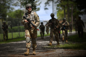 Staff Sgt. Jacob Tapley, 159th Civil Engineer Squadron, takes part in dismounted patrol tactics as part of basic combat skills training at the Air Dominance Center in Savannah, Ga., June 7, 2021. The basic combat skills training was instructed by the 159th Security Forces Squadron as part unit operations readiness during annual training. (U.S. Air National Guard photo by Senior Master Sgt. Daniel Farrell)