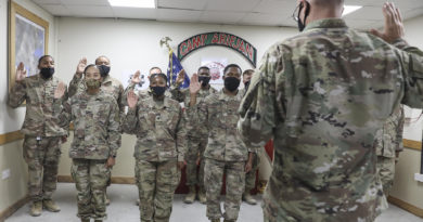 Brig. Gen. Keith Waddell, the adjutant general of the Louisiana National Guard, administers the oath of enlistment for Soldiers of the 527th Engineer Battalion, who are currently deployed to Kuwait in support of U.S. Central Command. (U.S. Army National Guard photo by Staff Sgt. Noshoba Davis)