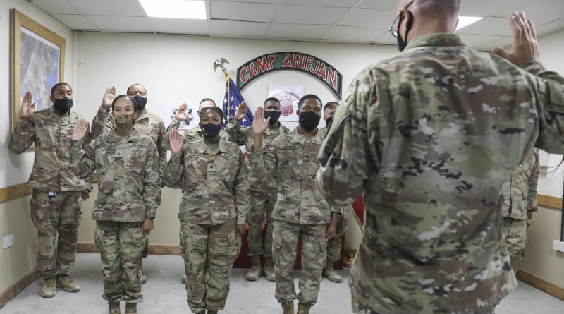 Brig. Gen. Keith Waddell, the adjutant general of the Louisiana National Guard, administers the oath of enlistment for Soldiers of the 527th Engineer Battalion, who are currently deployed to Kuwait in support of U.S. Central Command. (U.S. Army National Guard photo by Staff Sgt. Noshoba Davis)