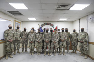 Brig. Gen. Keith Waddell, the adjutant general of the Louisiana National Guard, administers the oath of enlistment for Soldiers of the 527th Engineer Battalion, who are currently deployed to Kuwait in support of U.S. Central Command. (U.S. Army National Guard photo by Staff Sgt. Noshoba Davis)