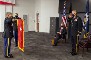 Maj. Gen. Keith Waddell, adjutant general of the Louisiana National Guard, returns the salute of Command Sgt. Maj. Clifford Ockman, senior enlisted leader LANG, as his two-star flag is unfurled during his promotion ceremony at the Governor’s Office of Homeland Security and Emergency Preparedness on July 30, 2021, in Baton Rouge, La. in Baton Rouge, La. Maj. Gen. Waddell holds a Master’s in Strategic Studies from the United States Army War College and a Master’s in Homeland Security from Northwestern State University. (U.S. Air National Guard photo by Master Sgt. Toby Valadie)