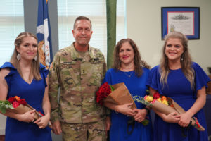 Maj. Gen. Lee Hopkins, assistant adjutant general of the Louisiana National Guard, and his wife, Lori, surrounded by their daughters, Ellen and Emma, stand during his promotion ceremony at the Armed Forces Reserve Center in Baton Rouge, Louisiana, Aug. 20, 2021. Hopkins, who has served in the Army for 37 years, is currently the principal military advisor to the adjutant general of the LANG, and is responsible for assisting in the deployment and coordination of programs, policies, and plans for the Louisiana Army and Air National Guard. (U.S. Army National Guard photo by Sgt. 1st Class Denis B. Ricou)