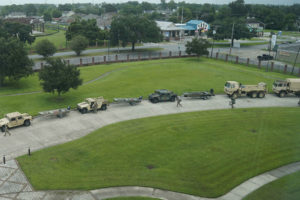 The Louisiana National Guardsmen with the 1-141 Field Artillery Battalion prepare in New Orleans ahead of Hurricane Ida, Aug. 27, 2021. In addition to 64 high-water vehicles and 61 rescue boats prepped and staged across south Louisiana, the LANG has 13 helicopters ready to support search and rescue, evacuation and recon missions as needed. (U.S. Army National Guard photo by Spc. Duncan Foote)