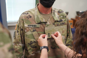 Maj. Gen. Lee Hopkins, assistant adjutant general of the Louisiana National Guard, is pinned with the two-star rank by his wife, Lori, during a ceremony at the Armed Forces Reserve Center in Baton Rouge, Louisiana, Aug. 20, 2021. Hopkins, who has served in the Army for 37 years, is currently the principal military advisor to the adjutant general of the LANG, and is responsible for assisting in the deployment and coordination of programs, policies, and plans for the Louisiana Army and Air National Guard. (U.S. Army National Guard photo by Sgt. 1st Class Denis B. Ricou)
