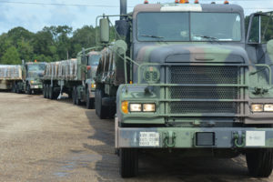 Soldiers from the 1083rd Transportation Company, 165th Combat Support Sustainment Battalion, 139th Regional Support Group, begin the staging of commodities ahead of Hurricane Ida's landfall. The 165th CSSB is the major commodities distirbution element during disaster reponse missions in the state of Louisiana. The La. Army National Guard is prepositioned and ready to assist whenever and whereever needed as the storm makes landfall.<br /> (U.S. Army National Guard photo by Staff Sgt. Scott D. Longstreet)