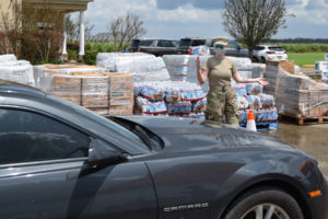 Airmen from the 159th Fighter Wing, Louisiana Air National Guard, manned Points of Distribution (POD) sites distributing food, water, ice and tarps to residents in Thibodaux, Louisiana, Sept. 1. POD members adhered to COVID-19 protocols while ensuring those in need received essential supplies to help alleviate the burden following Hurricane Ida. (U.S. Air National Guard photo by Staff Sgt. Ryan J. Sonnier)