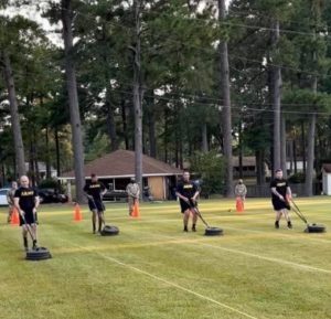 Students at the Louisiana Army National Guard’s Basic Leadership Course under 1st Battalion, 199th Regiment (Regional Training Institute) drag sleds during the Army Combat Fitness Test, September 2021, Ball, Louisiana. (Courtesy Photo)