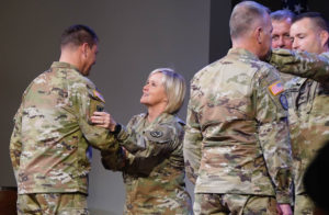 Louisiana National Guard Task Force COVID commander and Assistant Adjutant General - Army, Brig. Gen. Cindy H. Haygood, and 61st Troop Commander, Col. Eric Slaven, give awards to members of Task Force COVID at the First Baptist Church, Denham Springs, Louisiana, Dec. 1, 2021. The ceremony was one of a series of ceremonies across the state to honor more than 850 of LANG service members, recognizing their efforts in assisting the citizens of Louisiana during COVID-19 recovery operations. (U.S. Army National Guard photo by Spc. Duncan Foote)