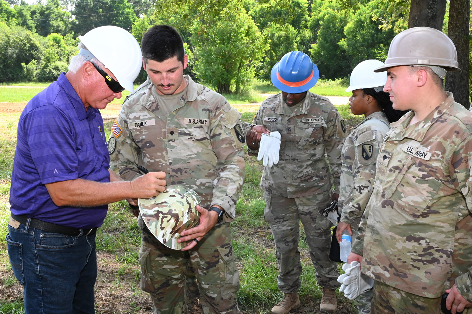 La. Guard command group and distinguished guest conduct tour of community project sites